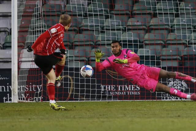 Ellery Balcombe saves from Anthony Scully's penalty. Picture: Craig Brough/AHPIX