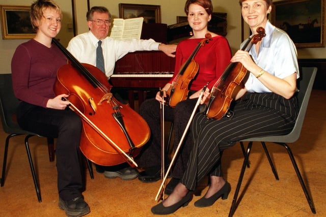 The Flethchers gave a lunchtime recital at Doncaster Museum and Art Gallery in 1999. Pictured after their performance are, left to right, 16 year old Sinead Fletcher, who plays cello, Jack Littlewood, piano and viola, Sarah Fletcher, aged 18 violin and mum Jean Fletcher whop also plays violin.