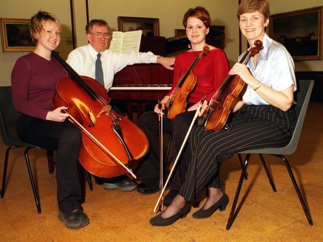 The Flethchers gave a lunchtime recital at Doncaster Museum and Art Gallery in 1999. Pictured after their performance are, left to right, 16 year old Sinead Fletcher, who plays cello, Jack Littlewood, piano and viola, Sarah Fletcher, aged 18 violin and mum Jean Fletcher whop also plays violin.