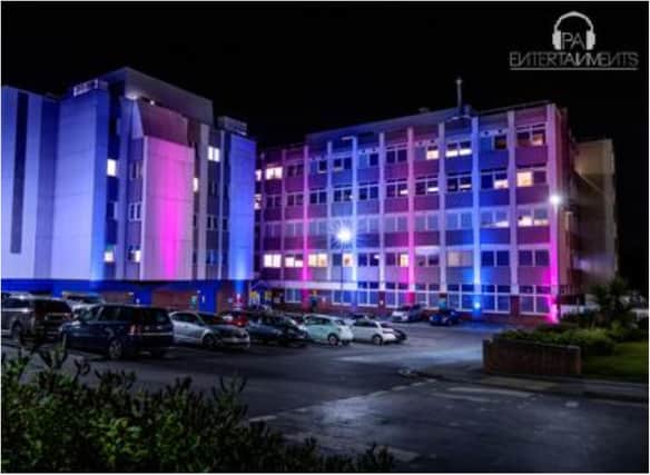 Doncaster Royal Infirmary has been lit up in pink and blue. (Photo: PA Entertainments).