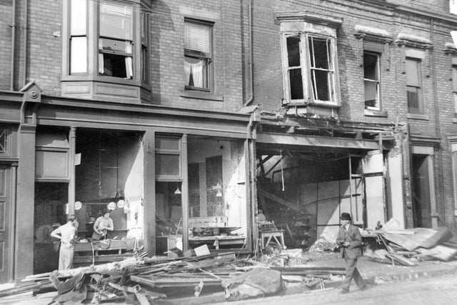 This was the scene in one Sunderland street where a shop was damaged after a Nazi plane crashed into a back alley.