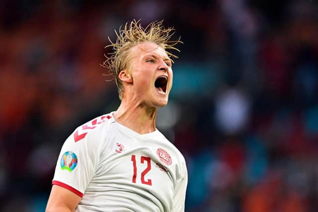 Denmark's Kasper Dolberg celebrates scoring against Wales. Photo by Olaf Kraak - Pool/Getty Images