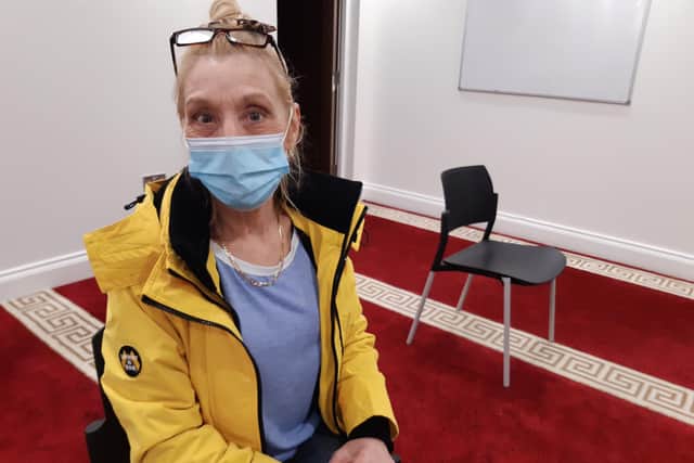 Kay Saunders waits to go home home after her vaccine at Belle Vue  Mosque, Doncaster