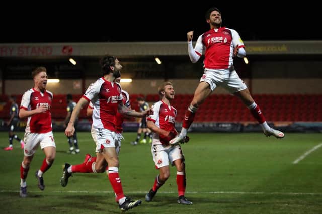 Danny Andrew celebrates scoring Fleetwood Town's third in their 3-1 win over Doncaster Rovers at Highbury last season. Photo: Clive Brunskill/Getty Images