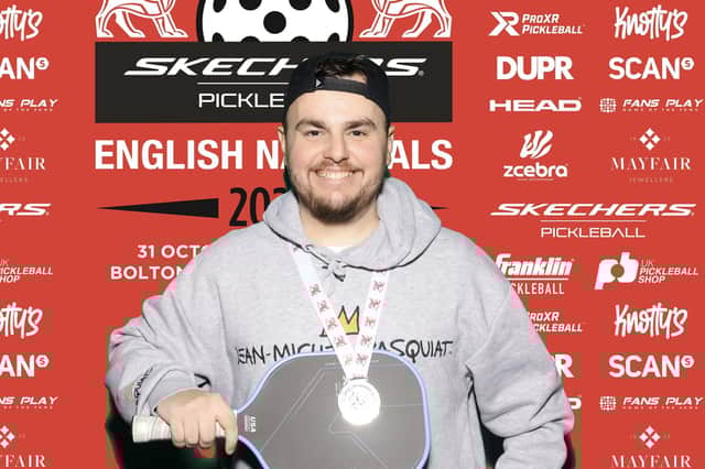 Stephen Hargreaves toasting pickleball medal success.