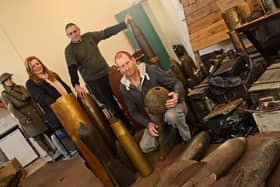 Victoria Cross Trust staff pictured with a small selection of items at Doncaster's VC Museum when it first opened.