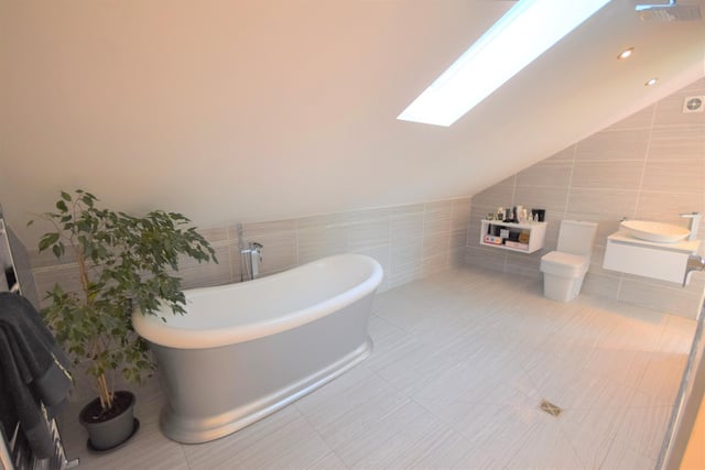 This is just one of the bathrooms that the property boasts, with a free standing bath tub.