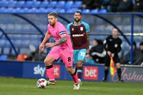 Adam Clayton in action for Doncaster Rovers.