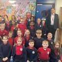 Mr Miliband and pupils of Scawsby Junior School.