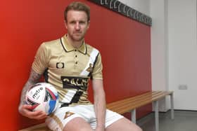 James Coppinger models the charity third kit he designed to mark his 17th and final season at the club. Picture: Andrew Roe/AHPIX