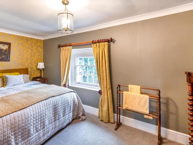Another of the property's four spacious bedrooms.