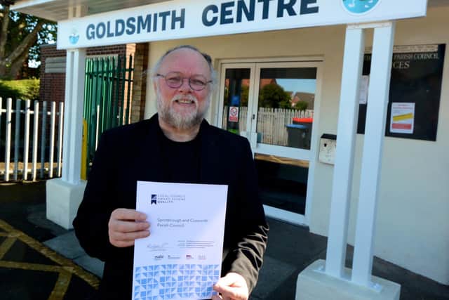Cllr Tony Nicholson, Chair of Sprotbrough and Cusworth Parish Council with the quality award certificate