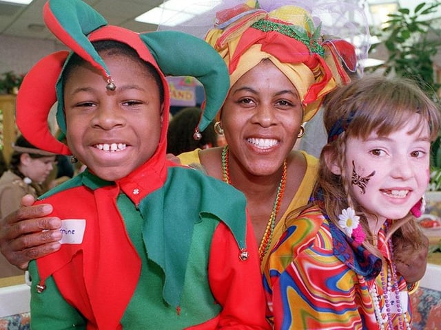 Easter fancy dress competitors at McDonalds on Saint Sepulchre Gate, Doncaster. Dining hostess Cynthia Deans, centre, joins in the fun with 10 year old Jermaine Green and 9 year old Kaylee Daniels, April 1998.