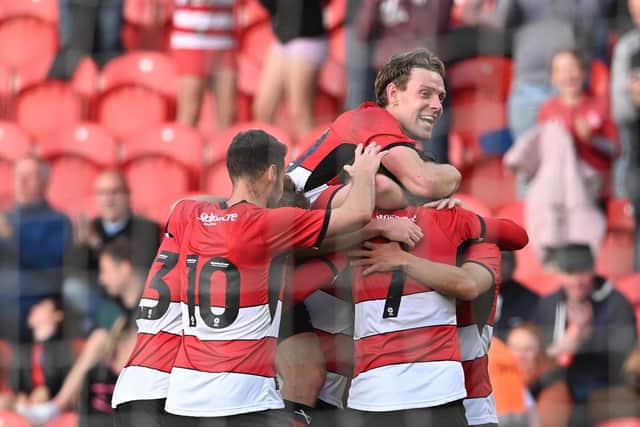 Doncaster Rovers have been tipped to improve on last season's lowly finish.