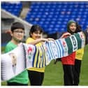 Doncaster Rovers feature on world’s longest multi-club scarf.