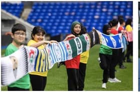 Doncaster Rovers feature on world’s longest multi-club scarf.