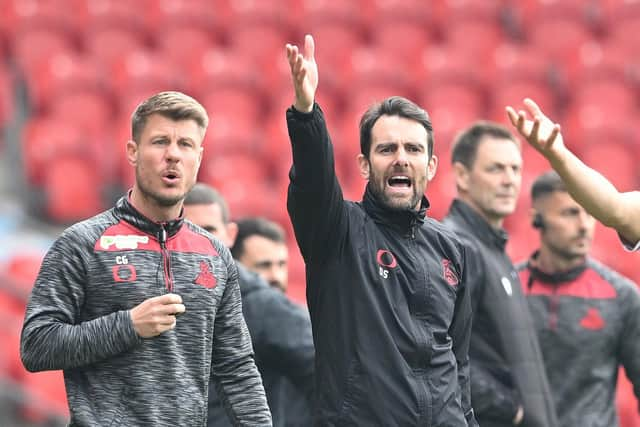 Doncaster's assistant boss Chad Gribble (left) and head coach Danny Schofield.