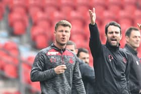 Doncaster's assistant boss Chad Gribble (left) and head coach Danny Schofield.