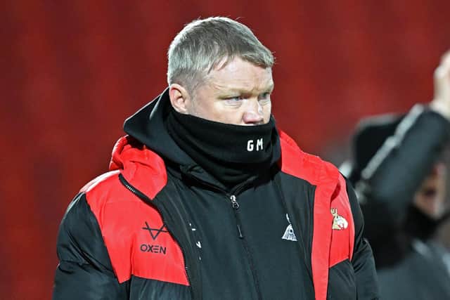 Grant McCann watches on during Rovers' EFL Trophy loss to Port Vale