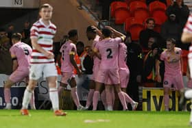 King's Lynn celebrate Gold Omotayo's winner. Picture: Howard Roe/AHPIX.com