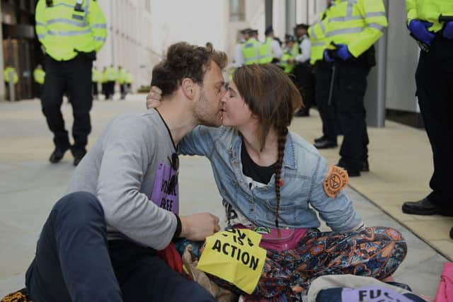 Michael and Addie protesting outside Shell, London