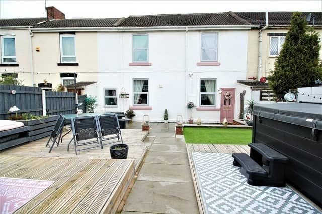 The approach to the property, through the landscaped front garden.