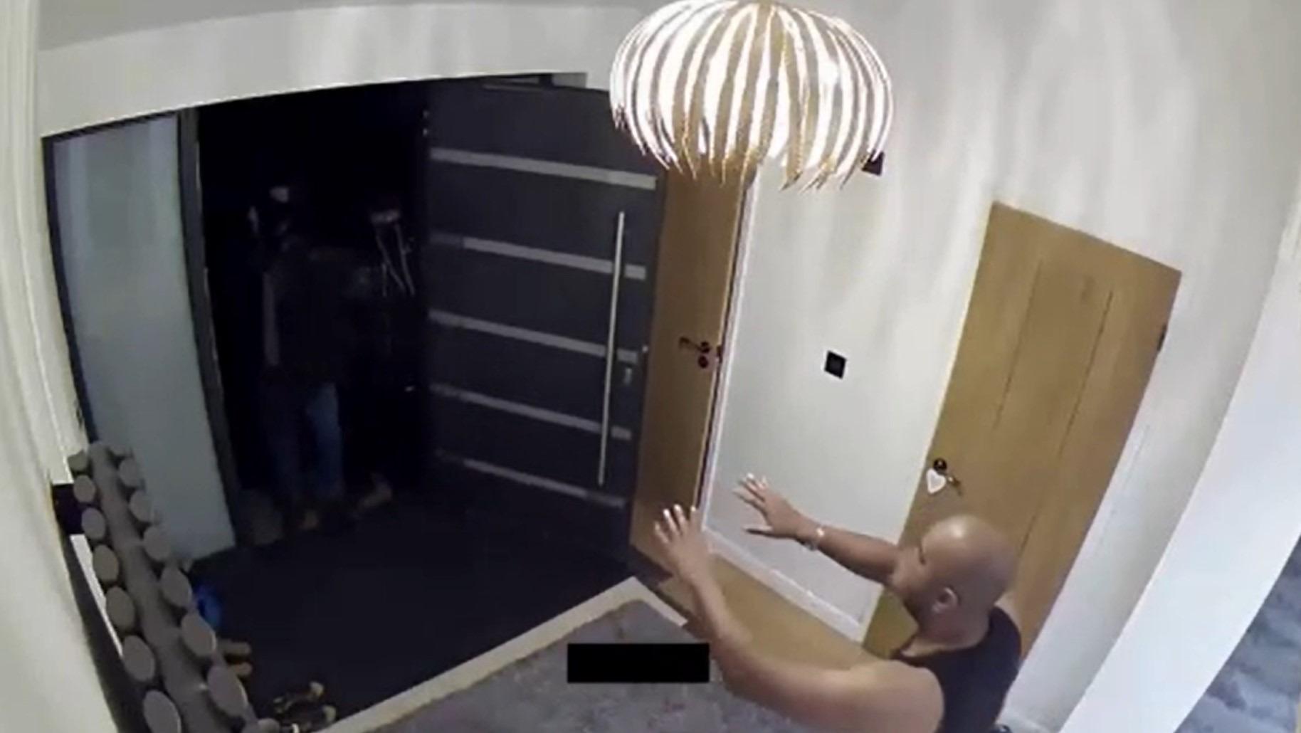 CCTV shows moment man is 'threatened at gunpoint' on his doorstep in staged incident as part of revenge plot
