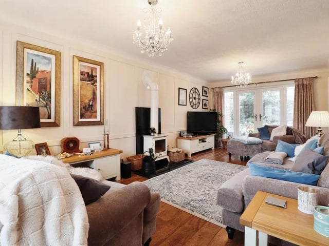 This sizeable lounge has French doors out to the garden.