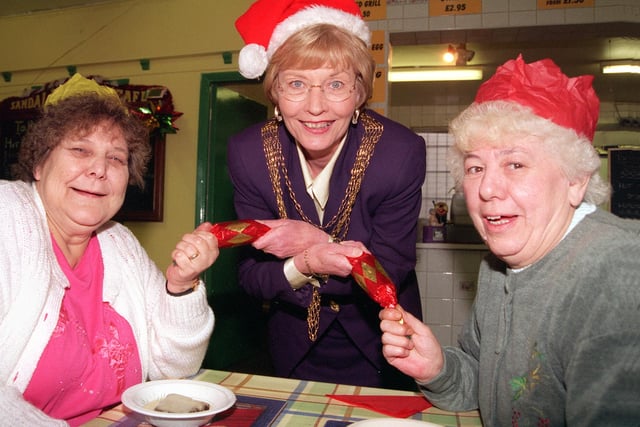 The Mayor of Doncaster, Councillor Yvonne Woodcock, pulls a cracker with Mrs Elsie Walters (left) and Mrs Emily McGarry and joins them at the pensoners' Christmas dinner at Sandall Park Cafe in 1998