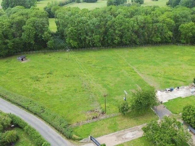 The property includes a grass paddock, and has planning consent for a stable building and manege on an existing concrete base.