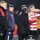 Grant McCann watches on during Rovers' humbling loss at Chesterfield.