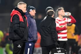 Grant McCann watches on during Rovers' humbling loss at Chesterfield.