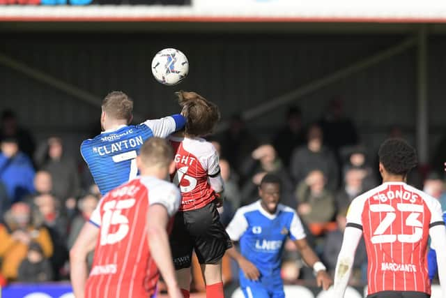 Adam Clayton received a second yellow card for this challenge. Picture: Howard Roe/AHPIX LTD