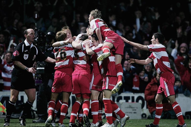 Doncaster Rovers celebrate their second goal during the Carling Cup match against Aston Villa at Belle Vue Stadium on November 29, 2005. Rovers won 3-0 to reach the quarter-finals.