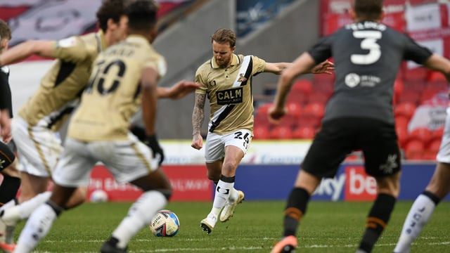 James Coppinger curls in a free kick to earn Rovers a point against Hull City. Picture: Howard Roe/AHPIX