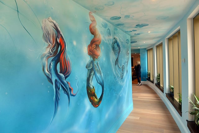 Walls housing spa reception spaces are hand-painted with a stunning, marine-coloured mermaid mural