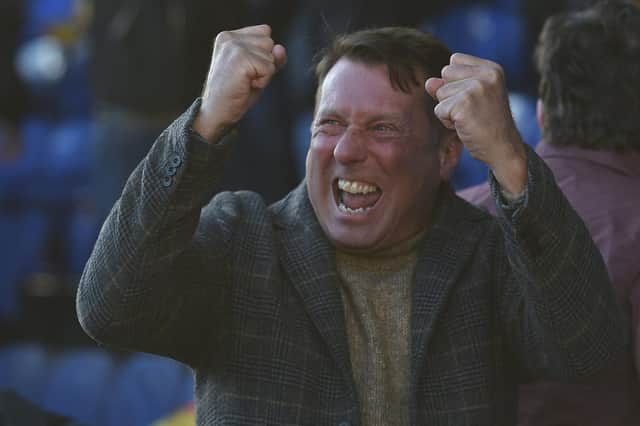 An ecstatic Rovers fan celebrates Tommy Rowe's equaliser. Picture: Martin Smith/AHPIX LTD