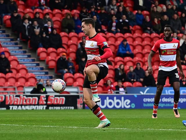 Luke Molyneux has a shot at goal against Accrington Stanley.