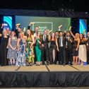 All the winners celebrate on stage at the South Yorkshire Sustainability Awards in 2022.