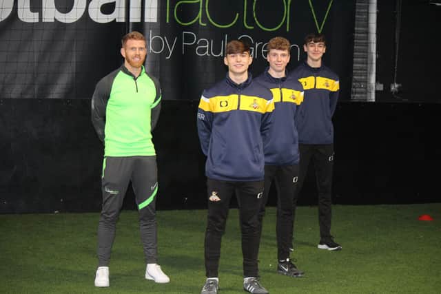 Former Doncaster Rovers midfielder Paul Green with new club scholars Josh Lindley, Tom Parkinson and Alex Fletcher.