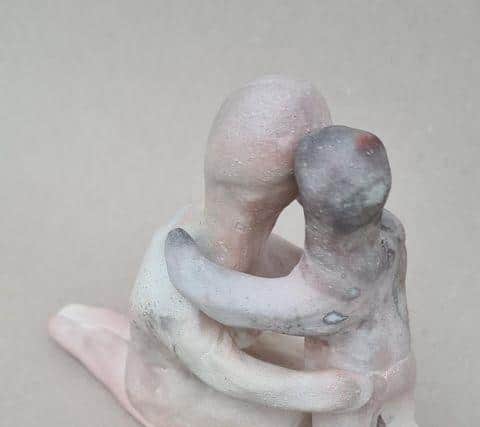 The figurines show loneliness and the feeling of being trapped.