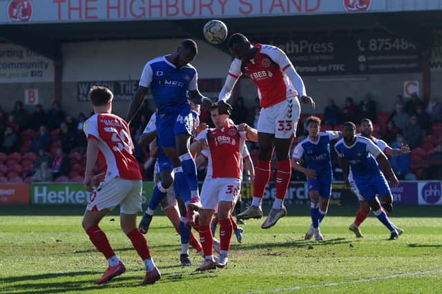 Reo Griffiths challenges for a header at Fleetwood.