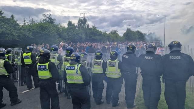 Demonstrators clashed with police at the Holiday Inn Express at Manvers in Wath in shocking scenes on Sunday afternoon.