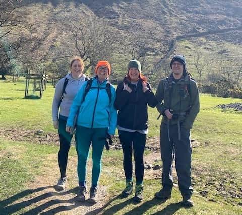 Four of the team - Cheryl Orr, Clare Attrill, Nicky Guttridge and Matt Capps training for the challenge after walking up Scafell Pike