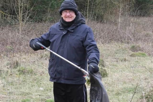 Tom Macleod litter picking at the Pitwood.