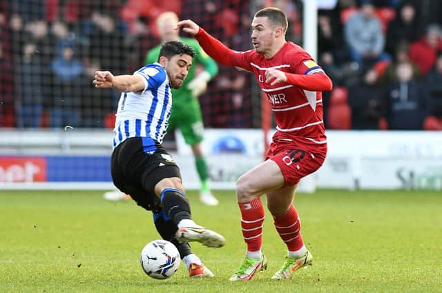 Tommy Rowe takes on Wednesday's Massimo Luongo. Picture: Andrew Roe/AHPIX LTD