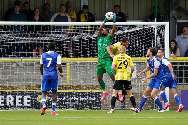 Trialist keeper Dillon Barnes claims a high ball against Harrogate Town. Picture: Steve Flynn/AHPIX