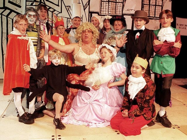 The main characters from the Adwick Park Junior School production of Pepys' Show. The show, a restoration musical telling the story of the great fire of London and the plague, contained extracts from The Diaries of Samuel Pepys. Pictured in the centre of this shot is year 6 tutor Bernard Hogden who shows he is a real sport by appearing in the show as Dirty Gertie, July 1998