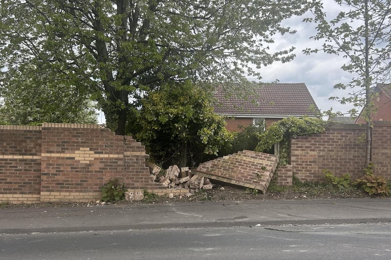 A garden wall was badly damaged.