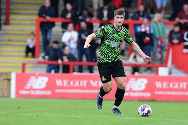 Adam Long could make his first start for Doncaster Rovers against Lincoln City tonight.